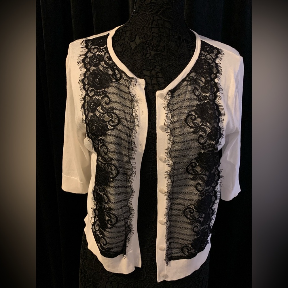 White sweater with black lace